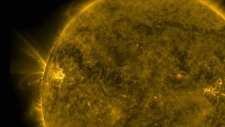 Bright arcing loops rotated into view Solar Dynamics Observa…