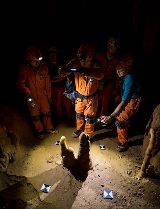 What are these astronauts doing? Underground worship? No, the science of photogr…