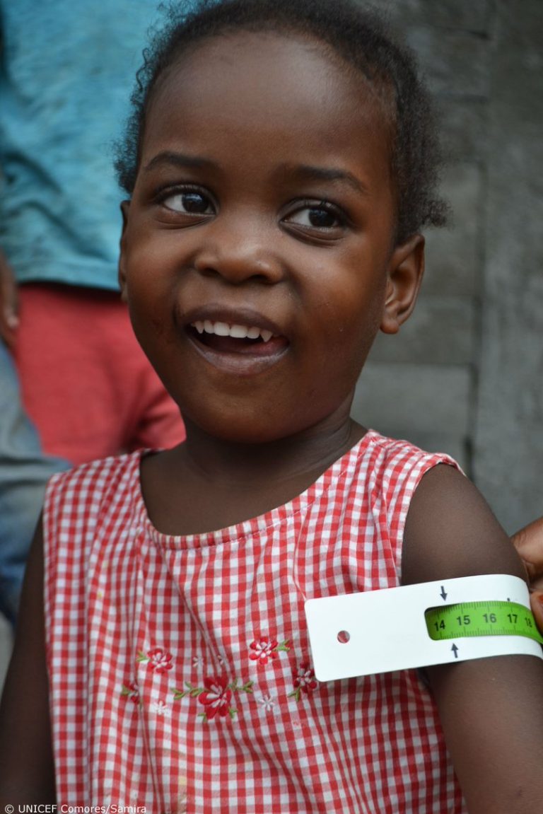 Inayida, 3, is screened for malnutrition during a national campaign supported by…