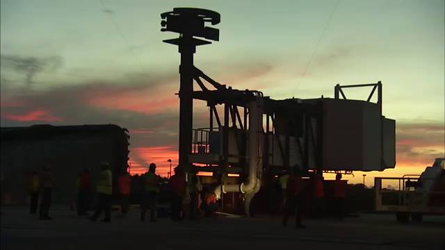 The Crew Access Arm astronauts will walk across to get to Bo…