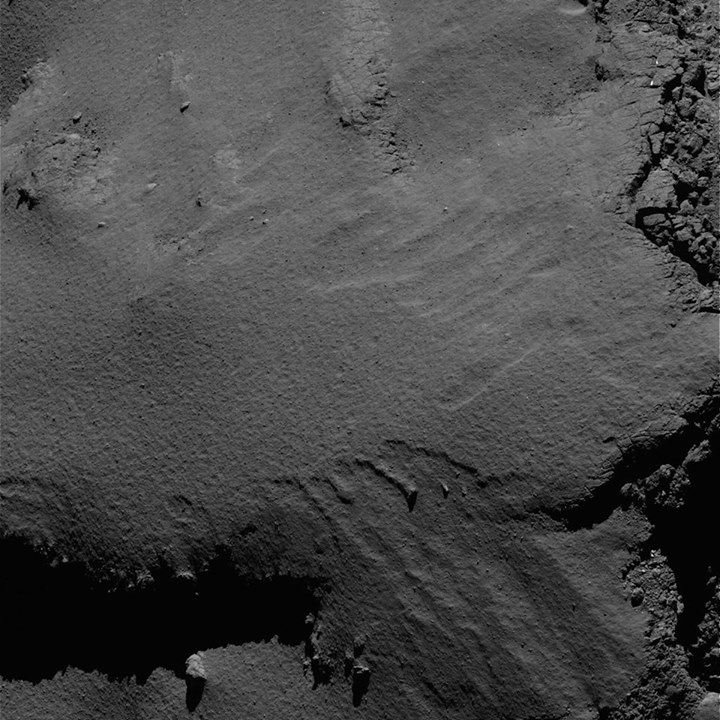 Oooh! Getting lower – Comet  #67P’s surface from a distance of only 7.5 km! Take…