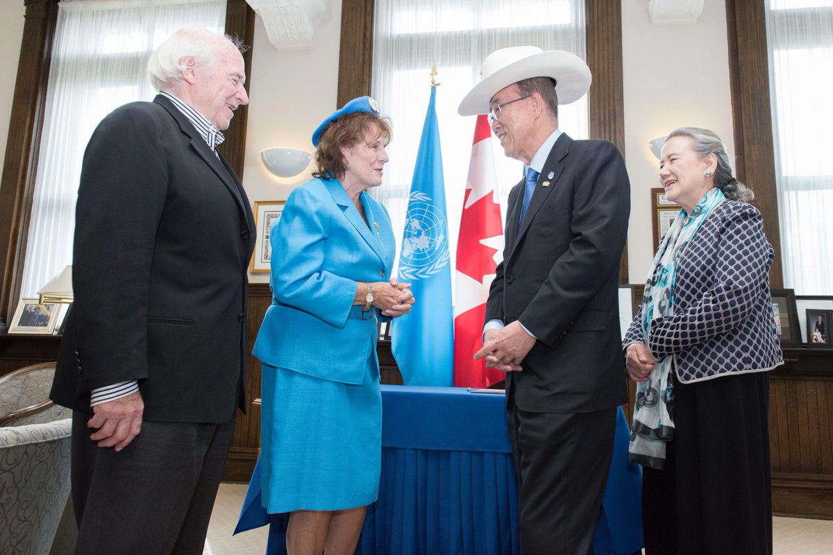Ban Ki-moon & Alberta Lt. Governor Lois E. Mitchell exchange hats at a court…