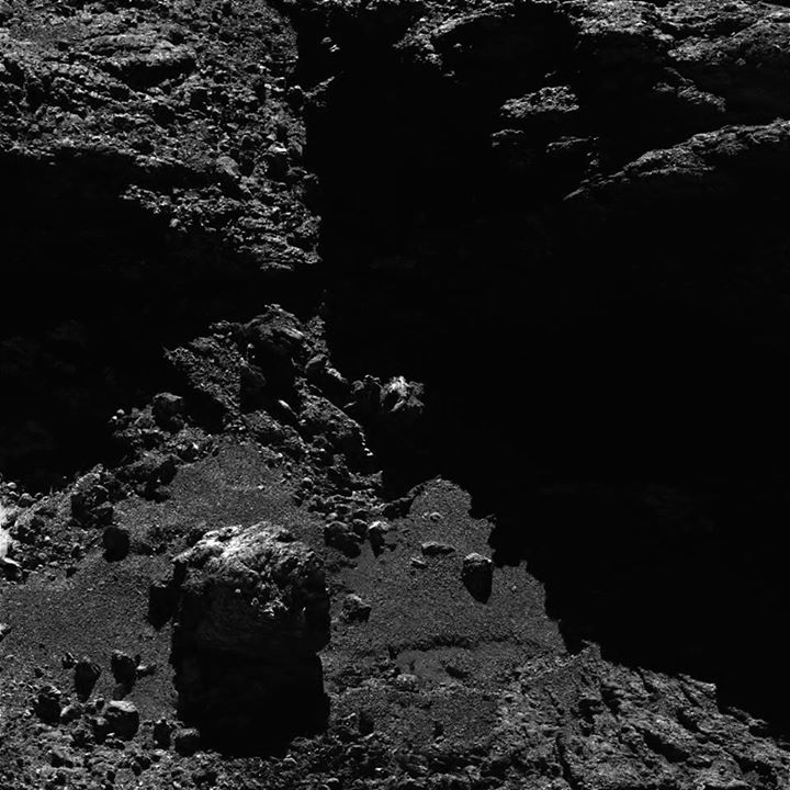 A close-up of the Khonsu region on Comet 67P, showing a large boulder, taken wit…