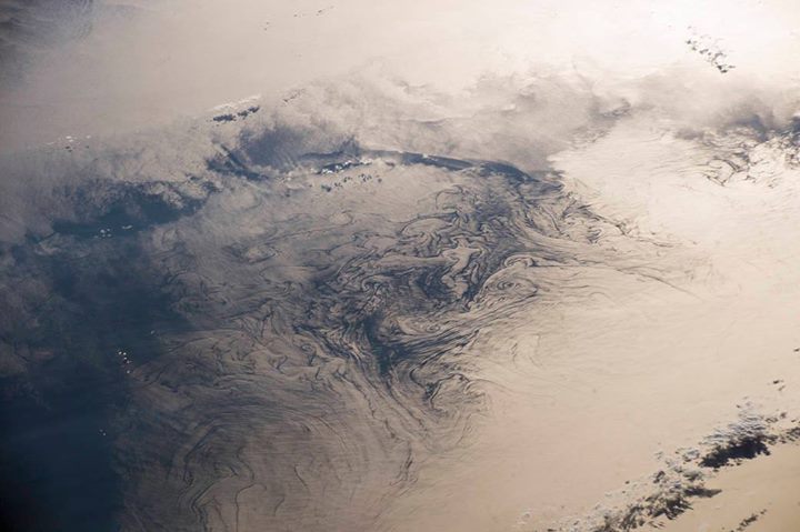 Water swirls seen in reflections off the waters of the Gulf …