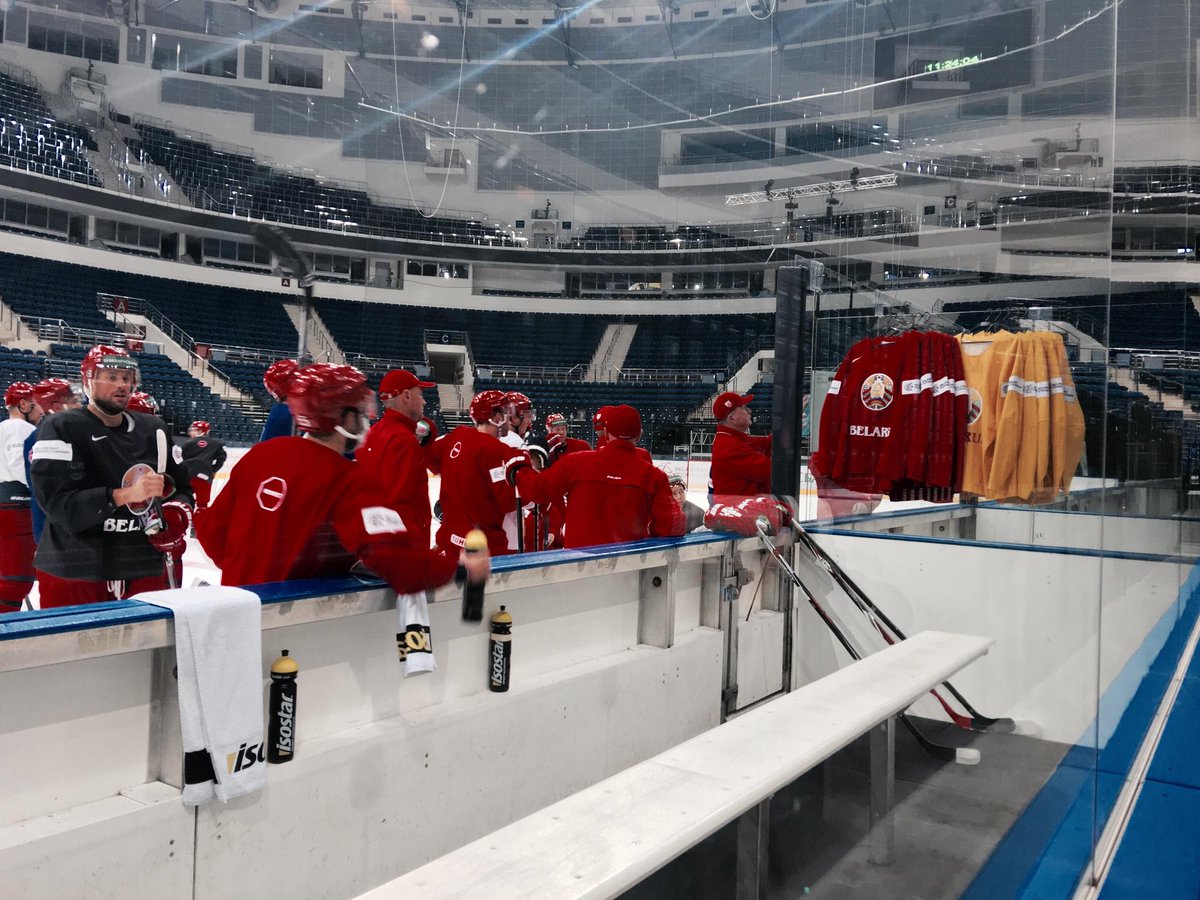 Belarus gathers around head coach Dave Lewis at their last practice before their…