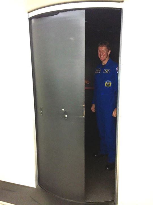 As if by magic: Tim Peake uses the airlock at the UK’s National Space Centre in …