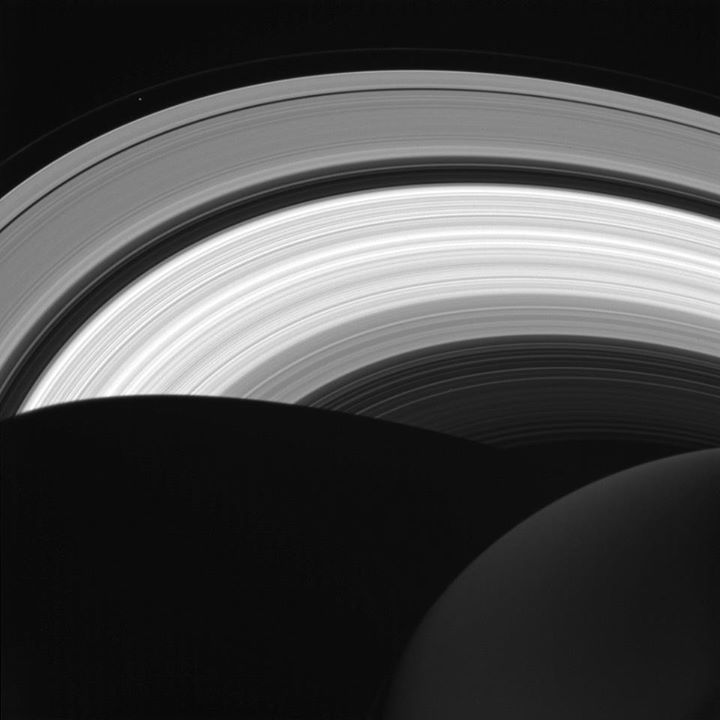 The international Cassini spacecraft looks down at the rings of Saturn from abov…