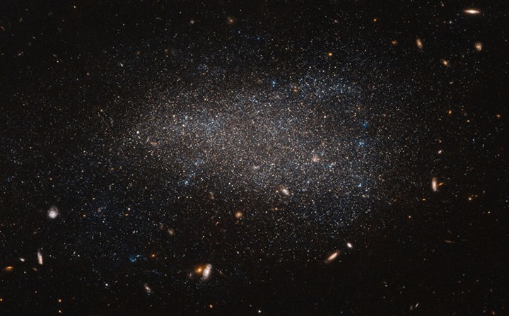 This NASA/ESA Hubble Space Telescope image shows NGC 4789A, a ‘dwarf irregular’ …
