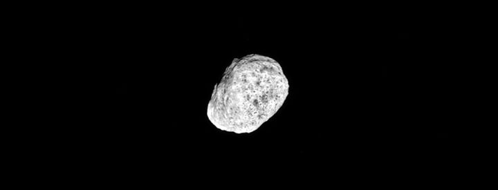 Hyperion, one of Saturn’s small moons, tumbles as it orbits …