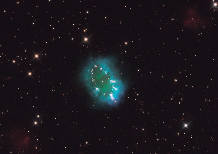Seen by the NASA/ESA Hubble Space Telescope, this object is PN G054.2-03.4., or …