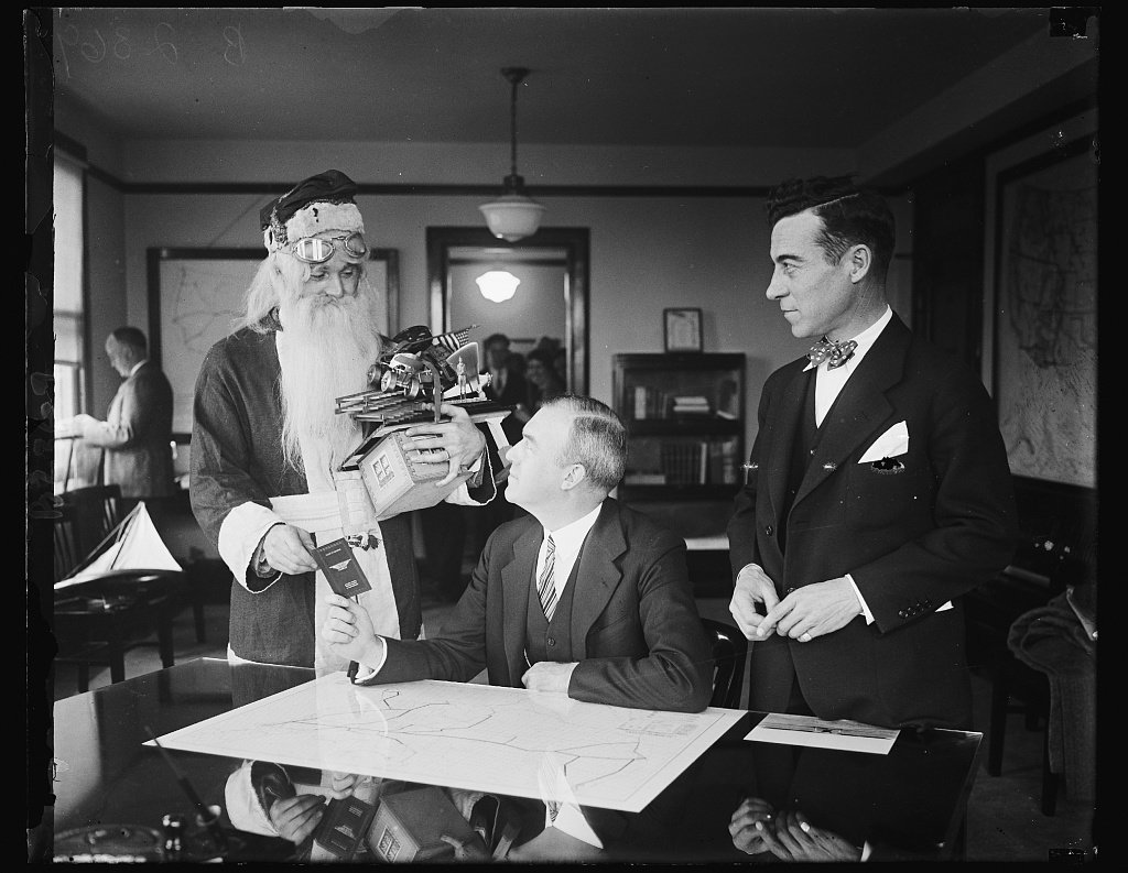 #TBT Santa receives his pilot’s license from the Assistant Secretary of @Commerc…