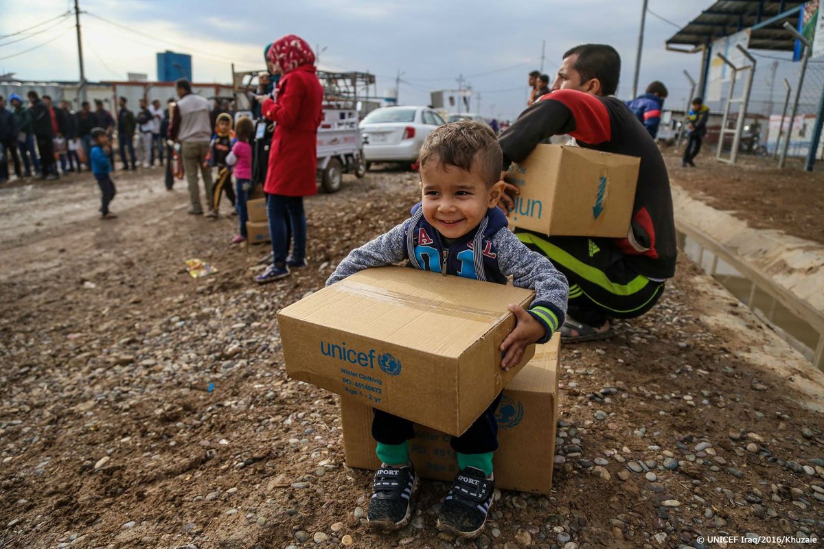 3-year-old Rafi from #Syria is all smiles after receiving warm clothing from @UN…