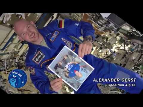 Each of the 2009 class of ESA astronauts had a photo taken of themselves holding…