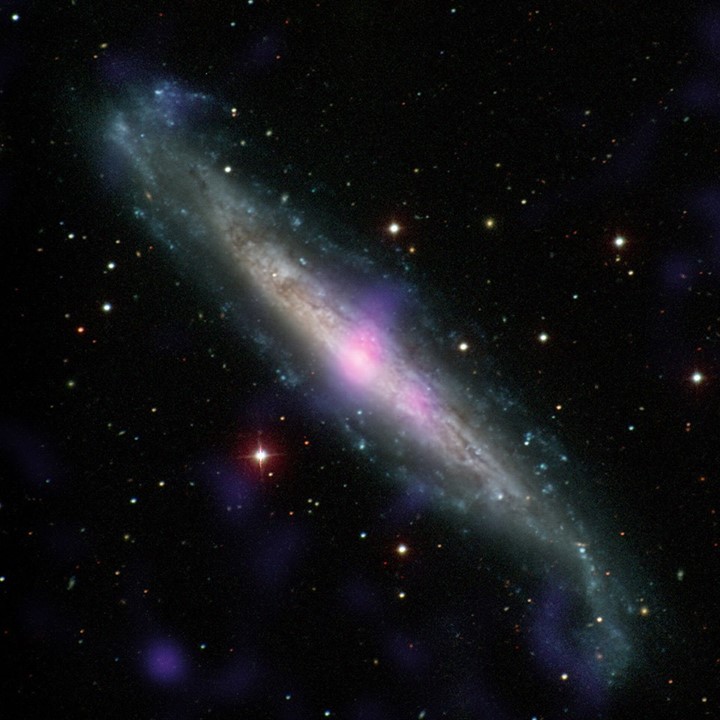 Black holes can lurk behind gas and dust, unseen by most tel…