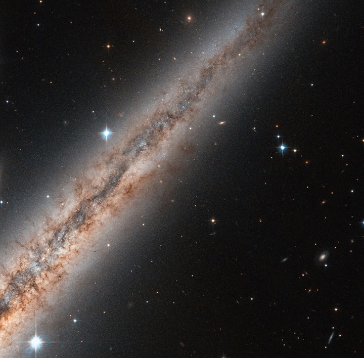 Visible in the constellation of Andromeda, NGC 891 is located approximately 30 m…