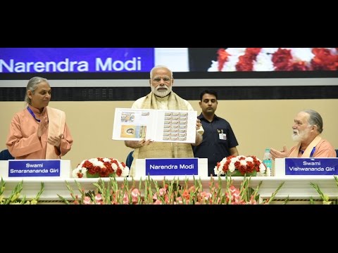 PM Modi releasing Special Commemorative Postage Stamp on 100 years of Yogoda Satsang Math