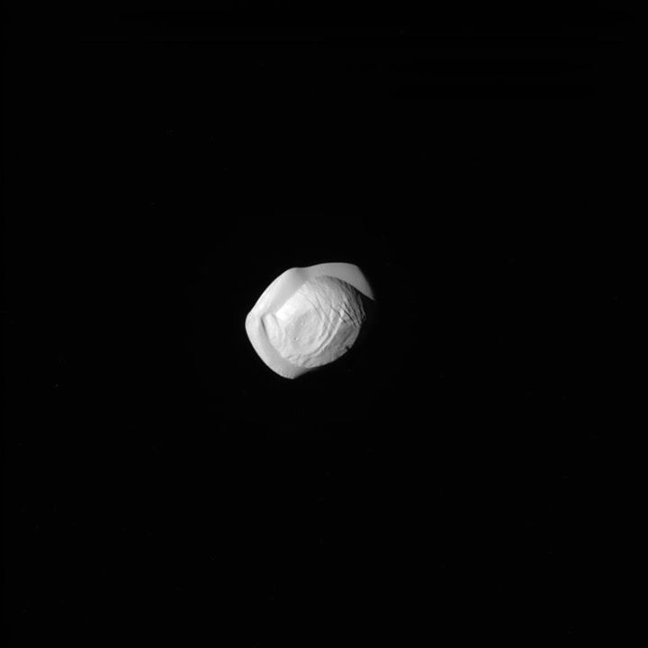 This raw, unprocessed image of Saturn’s strange-looking moon Pan was taken on 7 …