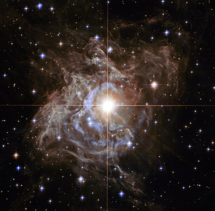 This NASA/ESA Hubble Space Telescope image shows RS Puppis, a type of variable s…
