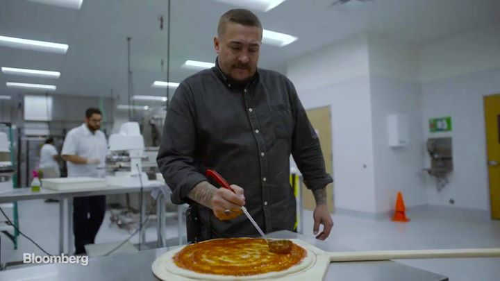 Which pizza would you prefer: made by people or by robots?  …