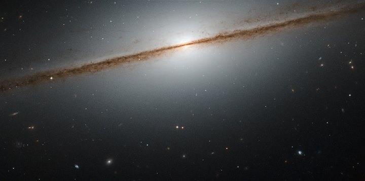 Galaxies can take many shapes and be oriented any way relative to us in the sky….