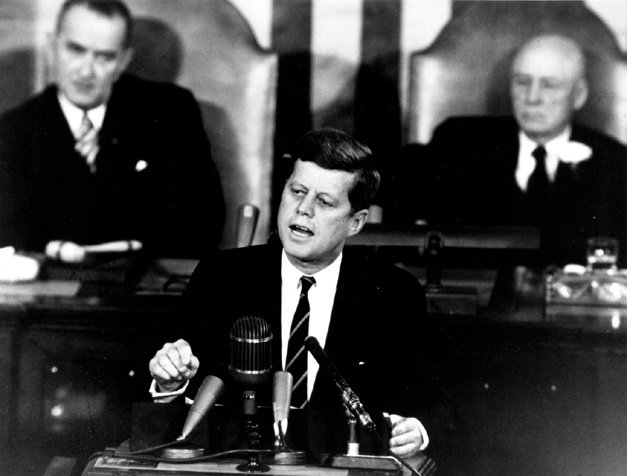 Today in 1961, President John F. Kennedy announces plans to send an American to …