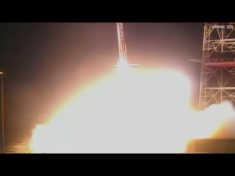 Nighttime Rocket Launch Creates Colorful Clouds in Space