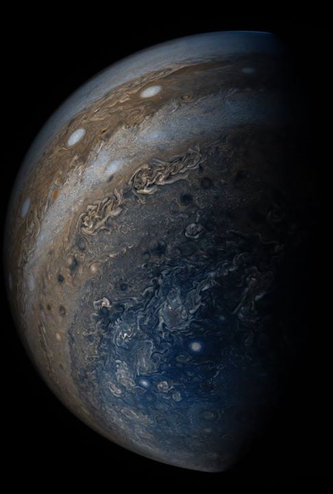 Jupiter’s clouds of many colors are seen in this image from …