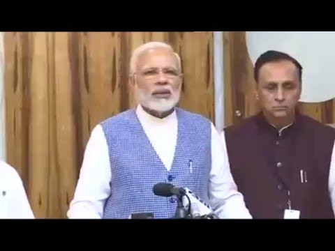 PM Modi addresses the media after reviewing the situation of flood affected areas, in Gujarat