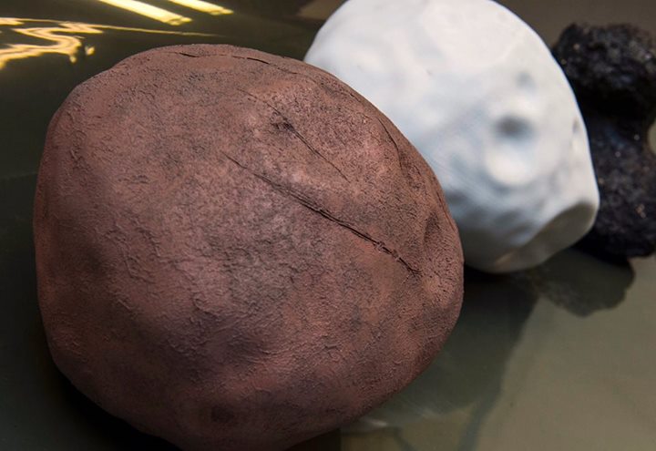 No, these are not dark and white chocolate truffles.

They are 3D-printed scale …