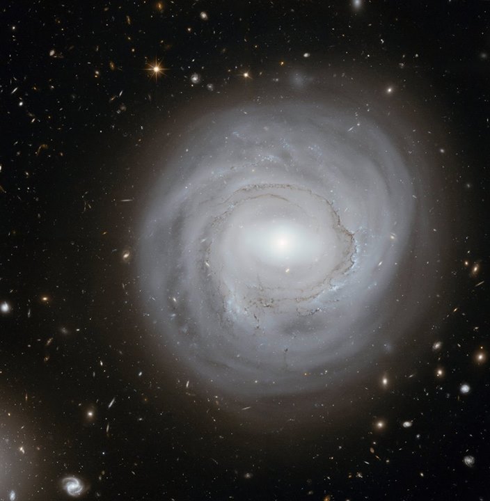 This image taken with the NASA/ESA Hubble Space Telescope shows the spiral galax…