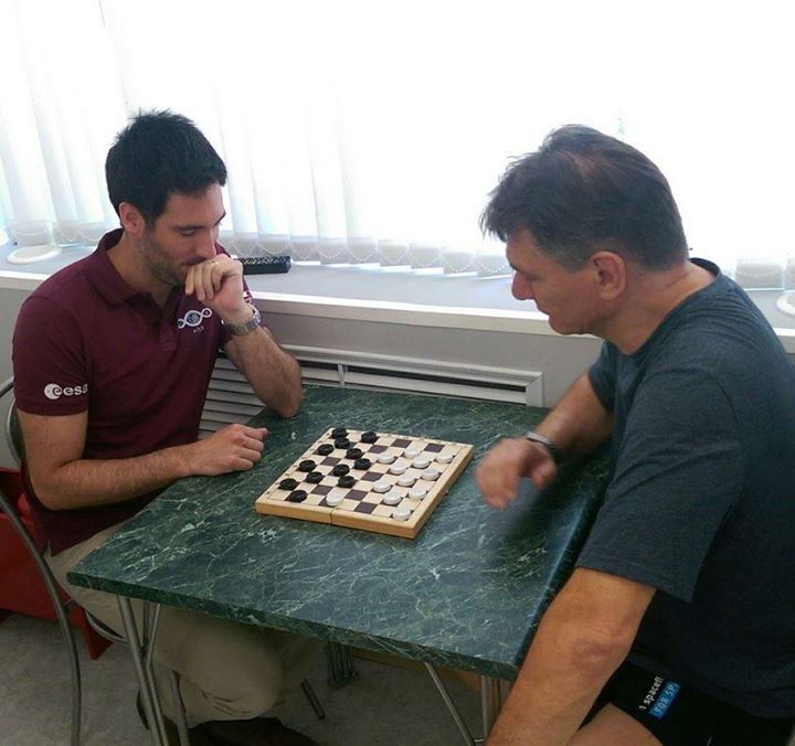 An intense game of checkers with my crew doctor… Your turn doc, the game is on…