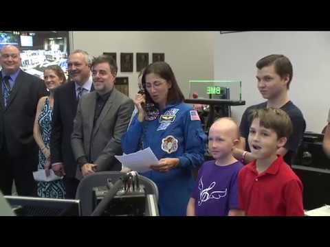 Space Station Crew Unveils “Space Suit” Designed by Cancer Patients on…