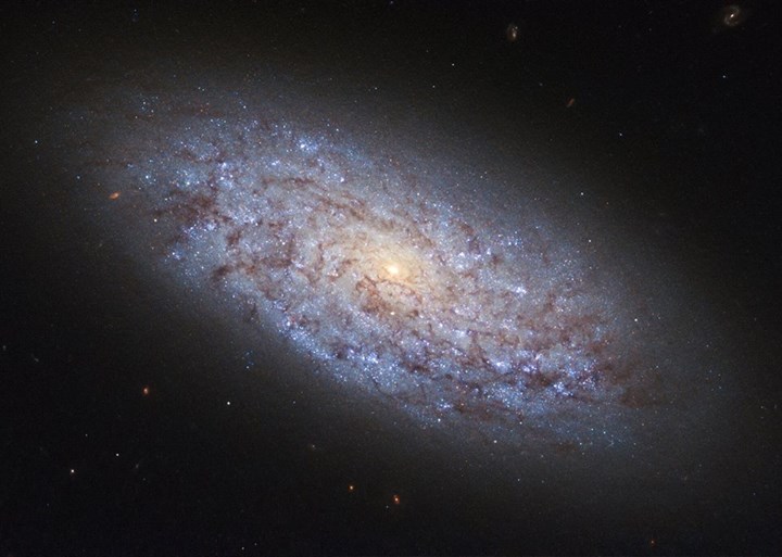 This NASA/ESA Hubble Space Telescope image is a dwarf galaxy named NGC 5949. Tha…