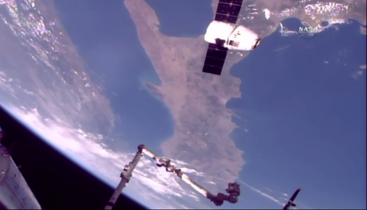 SpaceX Dragon cargo spacecraft flying over Italy as it approaches the robotic ar…