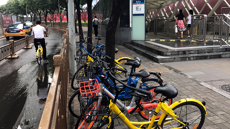 In Chinese Cities, Mobile-Based Car and Bike Sharing Programs Bring Both Benefits and Challenges