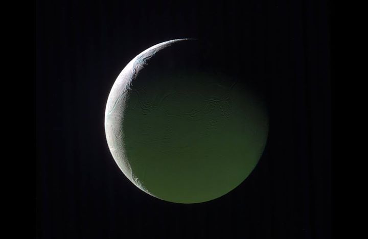 The brightly lit limb of a crescent Enceladus looks ethereal…