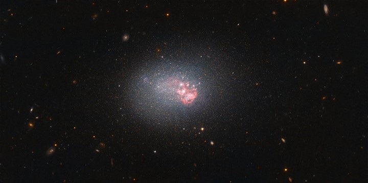 Clusters of young, hot stars speckle this galaxy, which has …