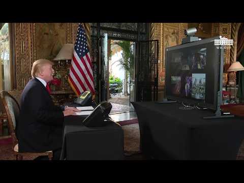 President Trump participates in a Christmas Eve video teleconference with members of the military