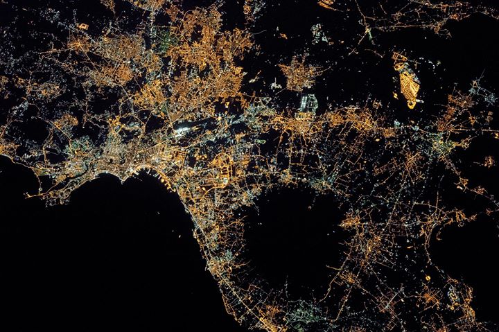 The sparkling city lights of Naples and the Campania region …