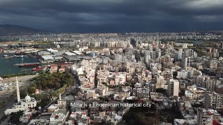 On a sunny summer morning, residents of El-Mina headed out t…